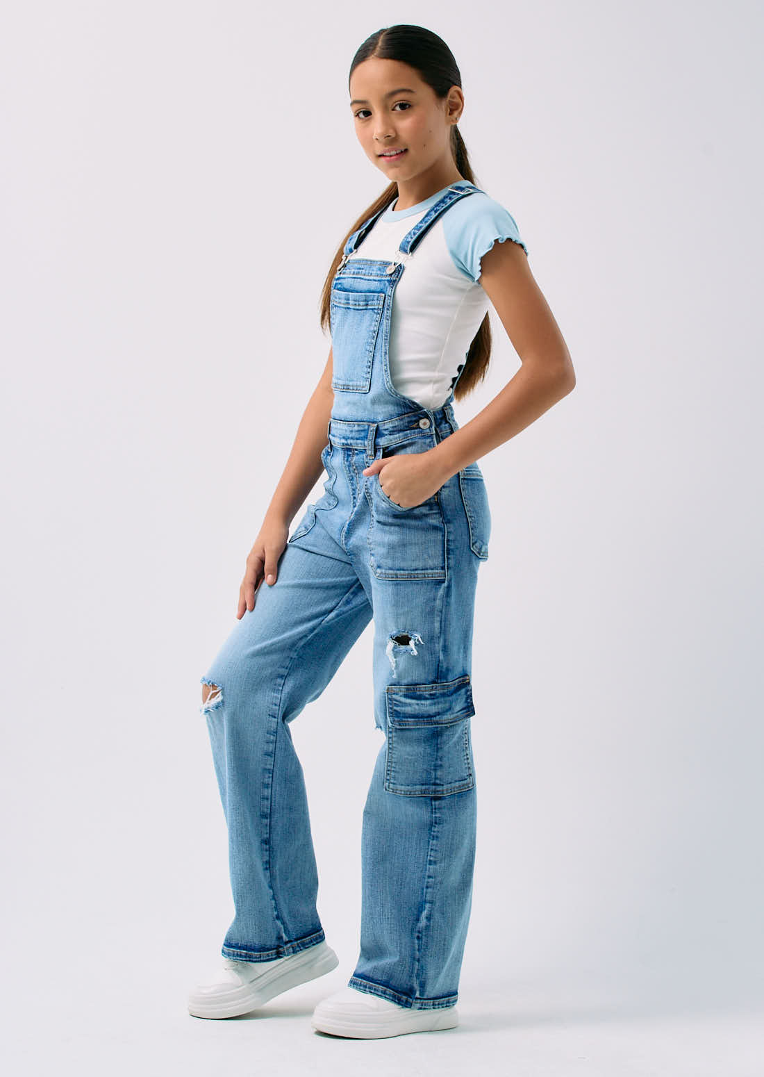Overall medio con bolsillos en costados para niñas